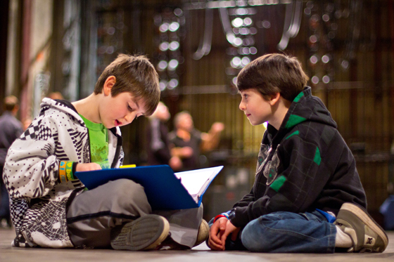 Brothers Jordan and Aidan Wessels studying their lines. Photo by Michael Julian Berz