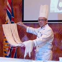 Chef preparing noodles
